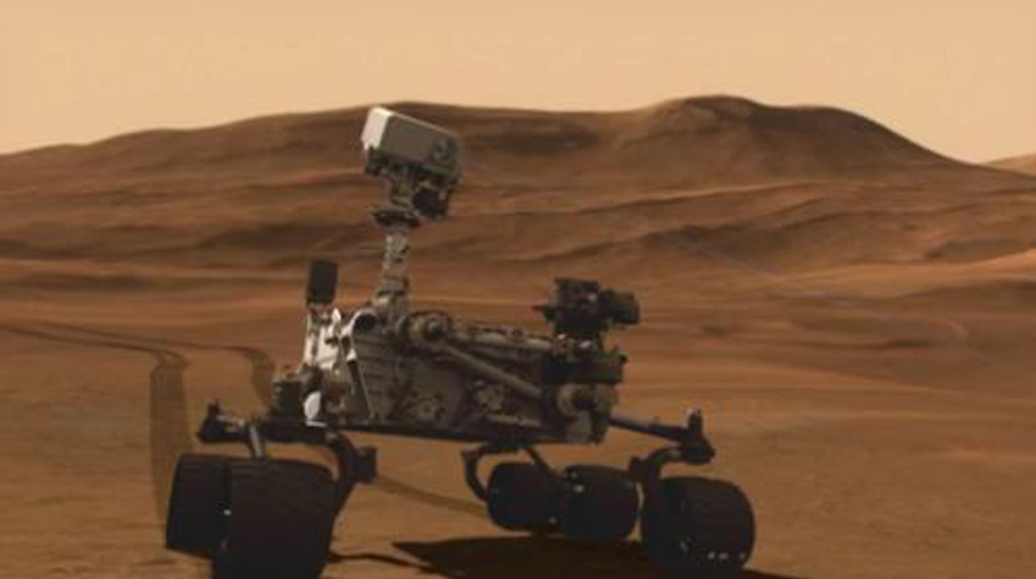  Curiosity använder sitt instrument ChemCam och skjuter laser på en sten (tyvärr syns laserstrålen lite dåligt på den här bilden).