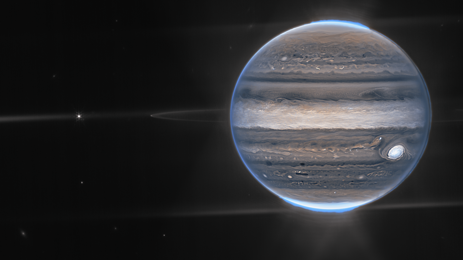 Jupiter_showcases_aurorae_hazes_NIRCam_widefield_view.png Jupiter