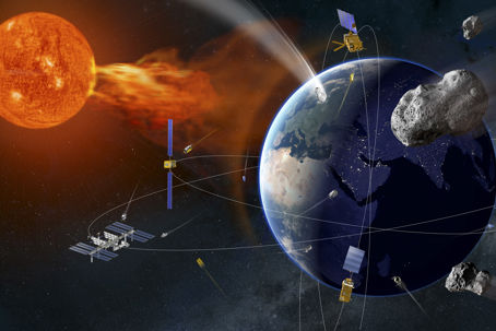 Cosmic.jpg Ett collage som visar solen, jorden, asteroider och satelliter